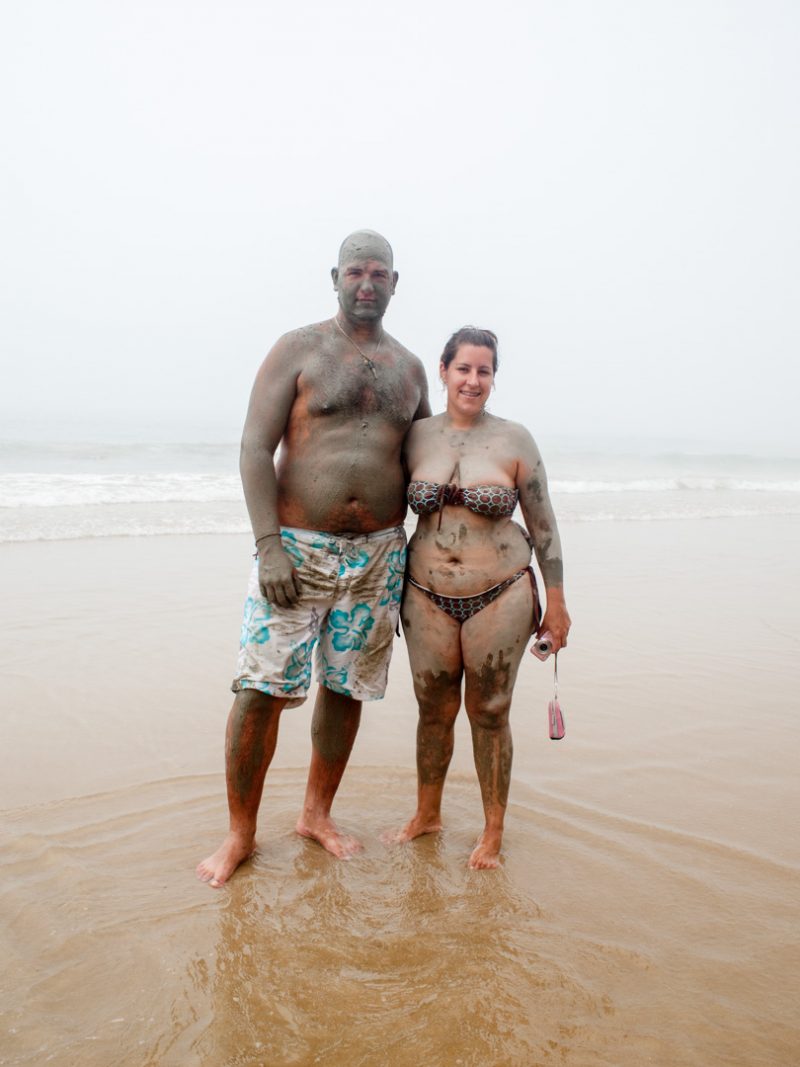 Conil, Tomas de la Rosa and girlfriend, covered in the clay thought to be good for skin and protect from sun